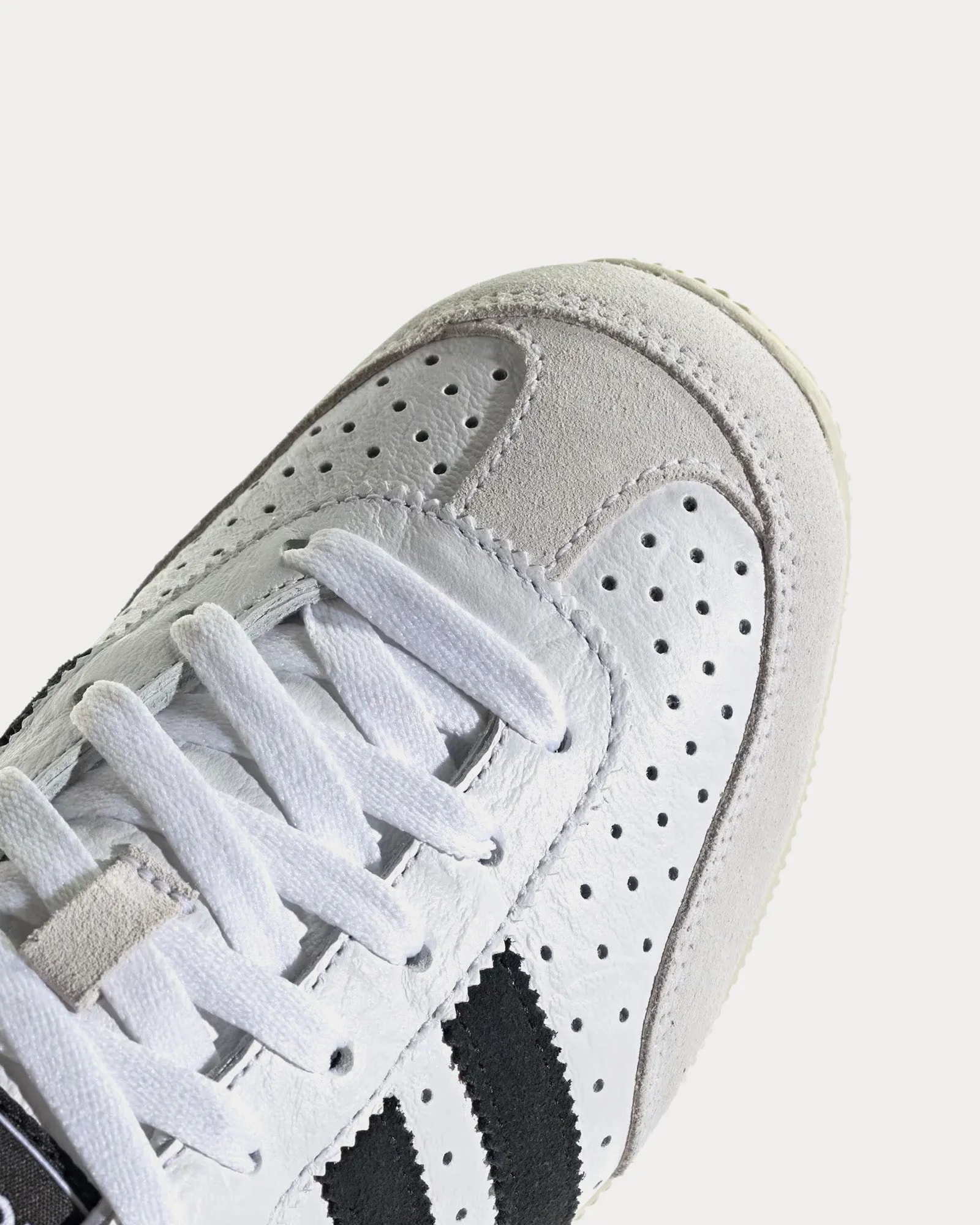 Japan Cloud White / Core Black / Gold Metallic Low Top Sneakers