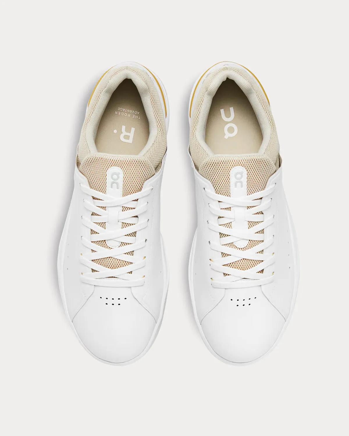 The Rodger Advantage White / Bronze Low Top Sneakers